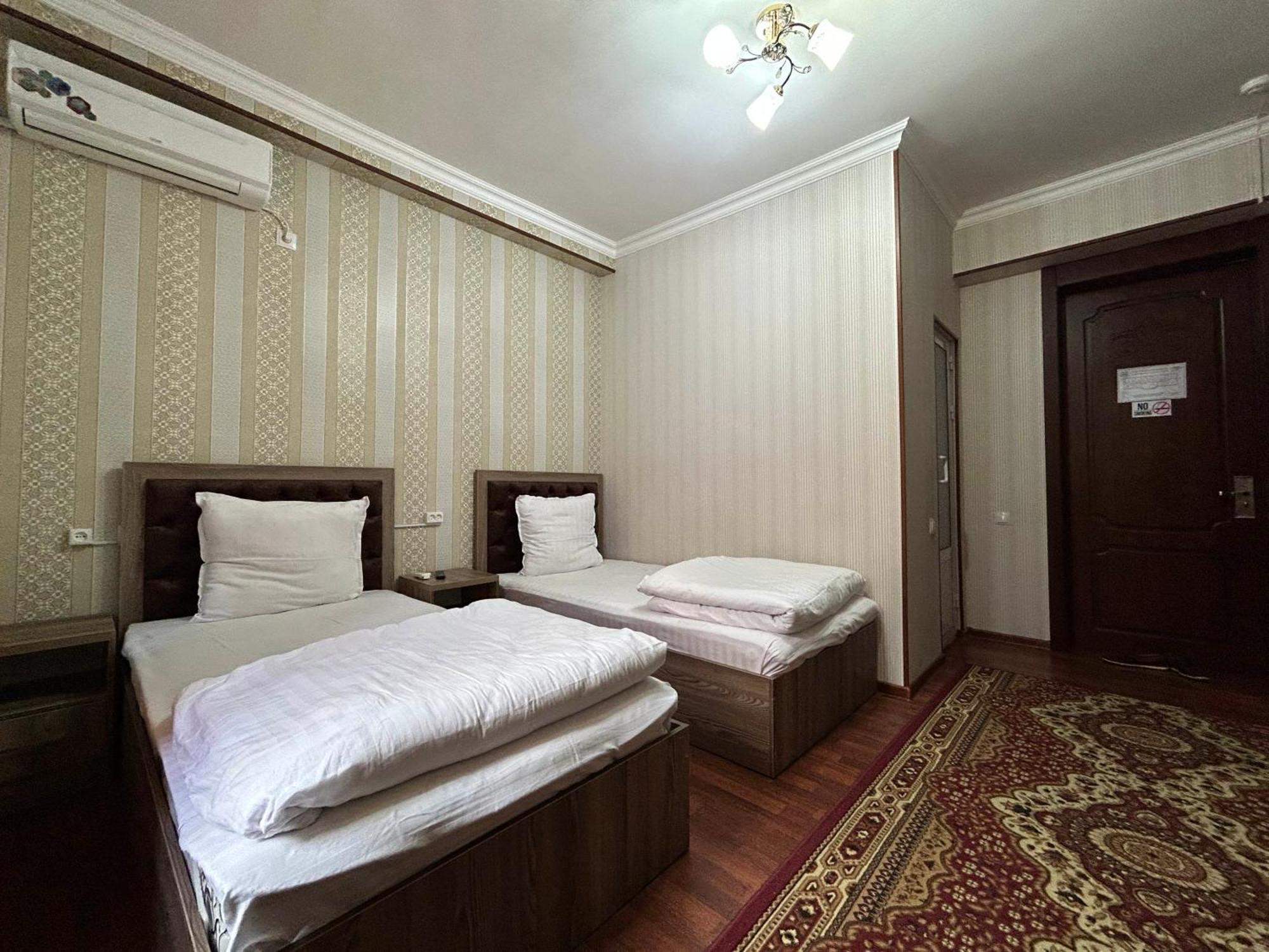 Hotel Ishonch Самарканд Номер фото